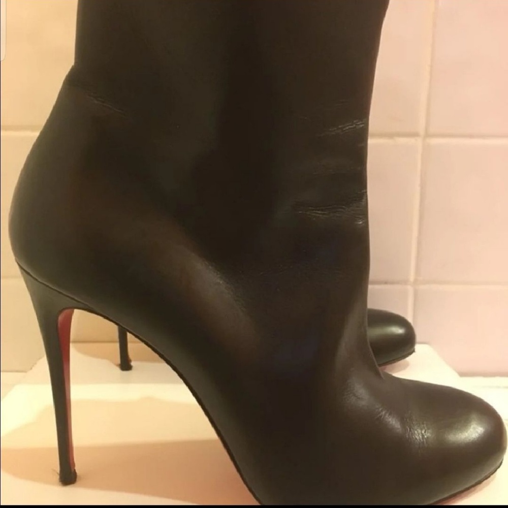 Used christian louboutin booties